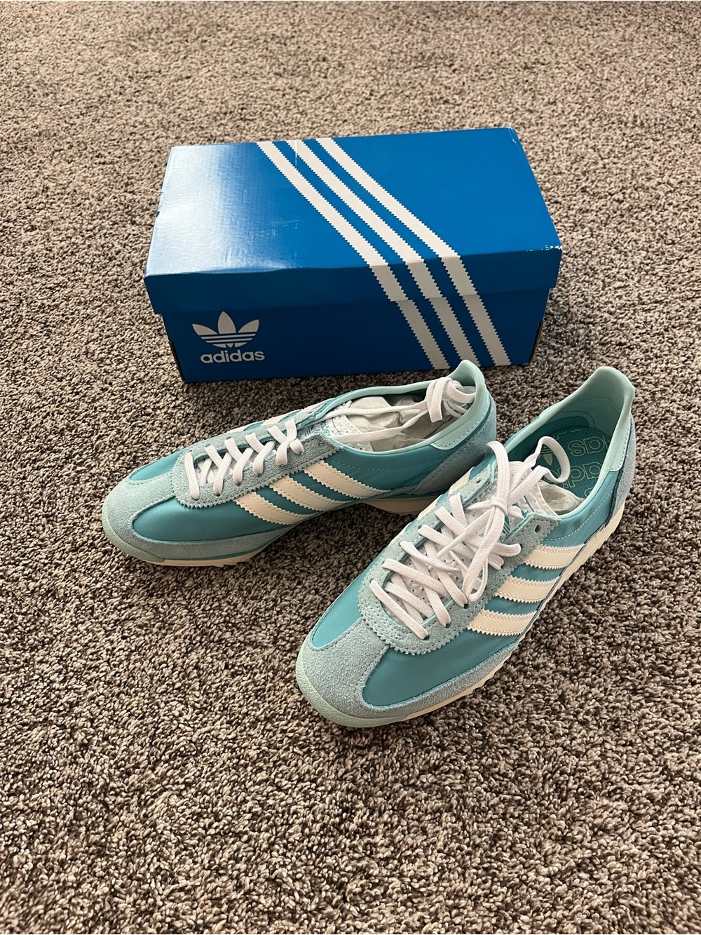 adidas Women’s turquoise Sneakers